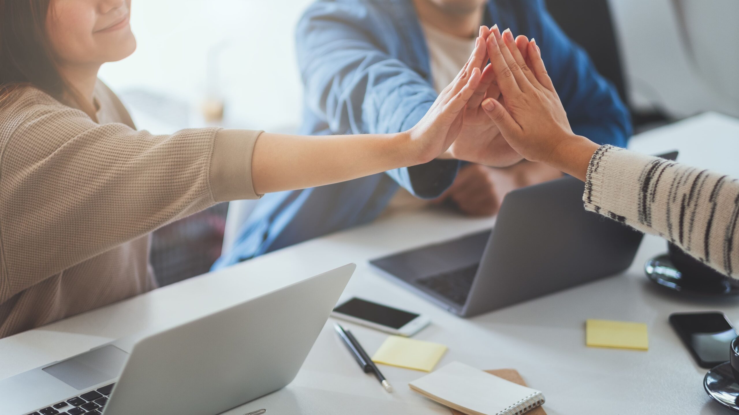 successful business team celebrates with high five 2026 03 13 04 15 30 utc (1)