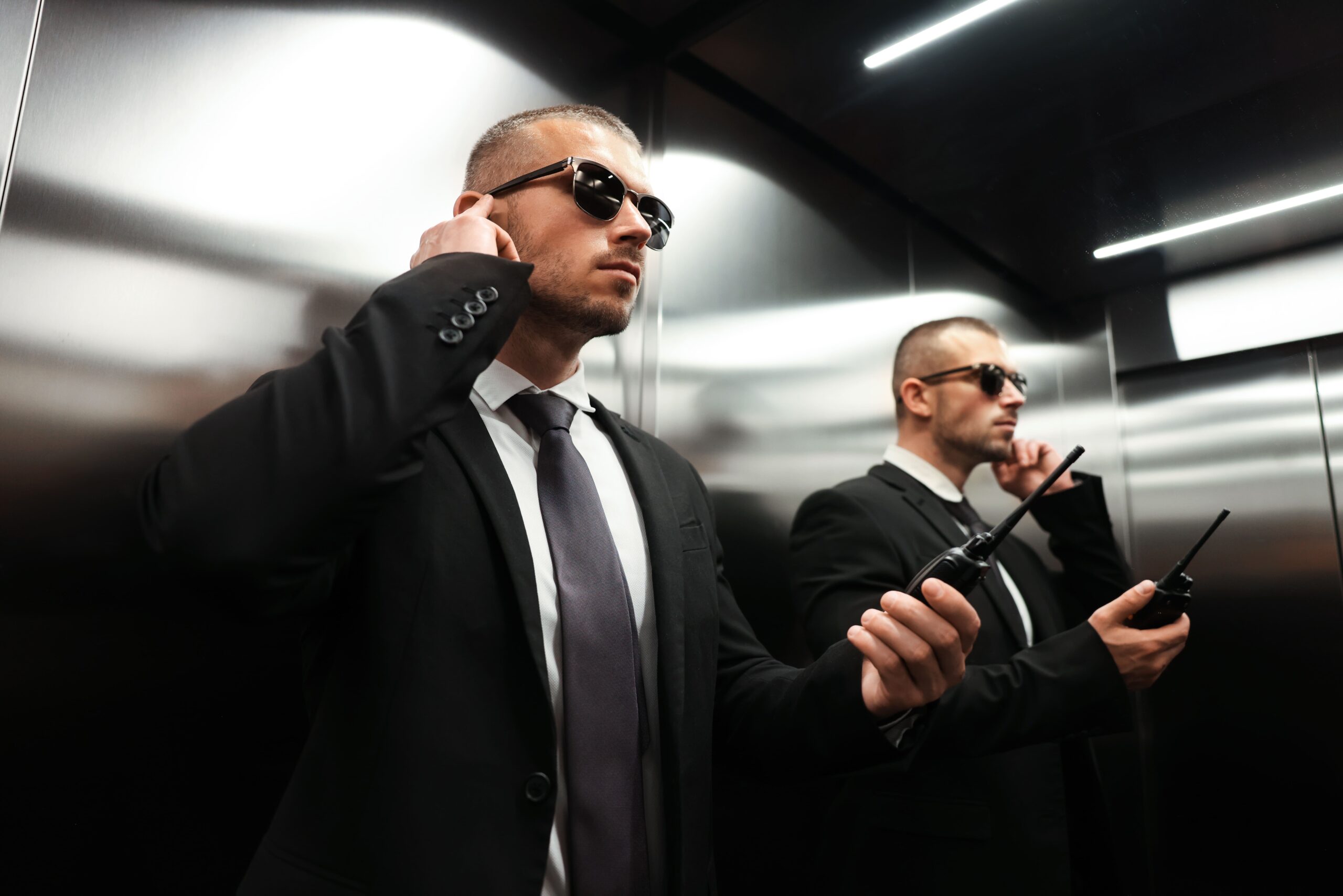 two professional security guards communicating in 2026 09 25 05 54 34 utc (1)
